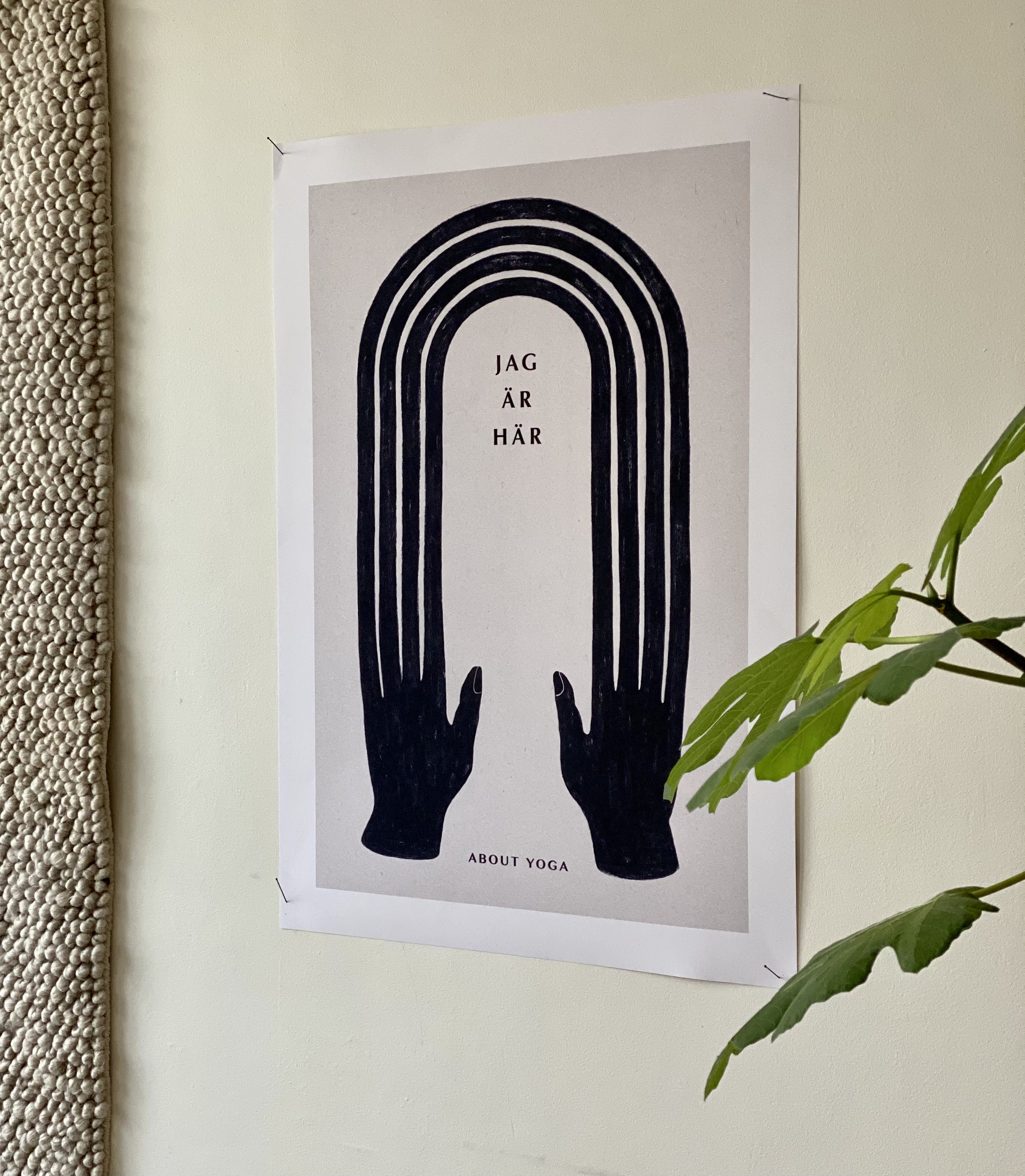 About Yoga — 'Jag är här' poster on wall